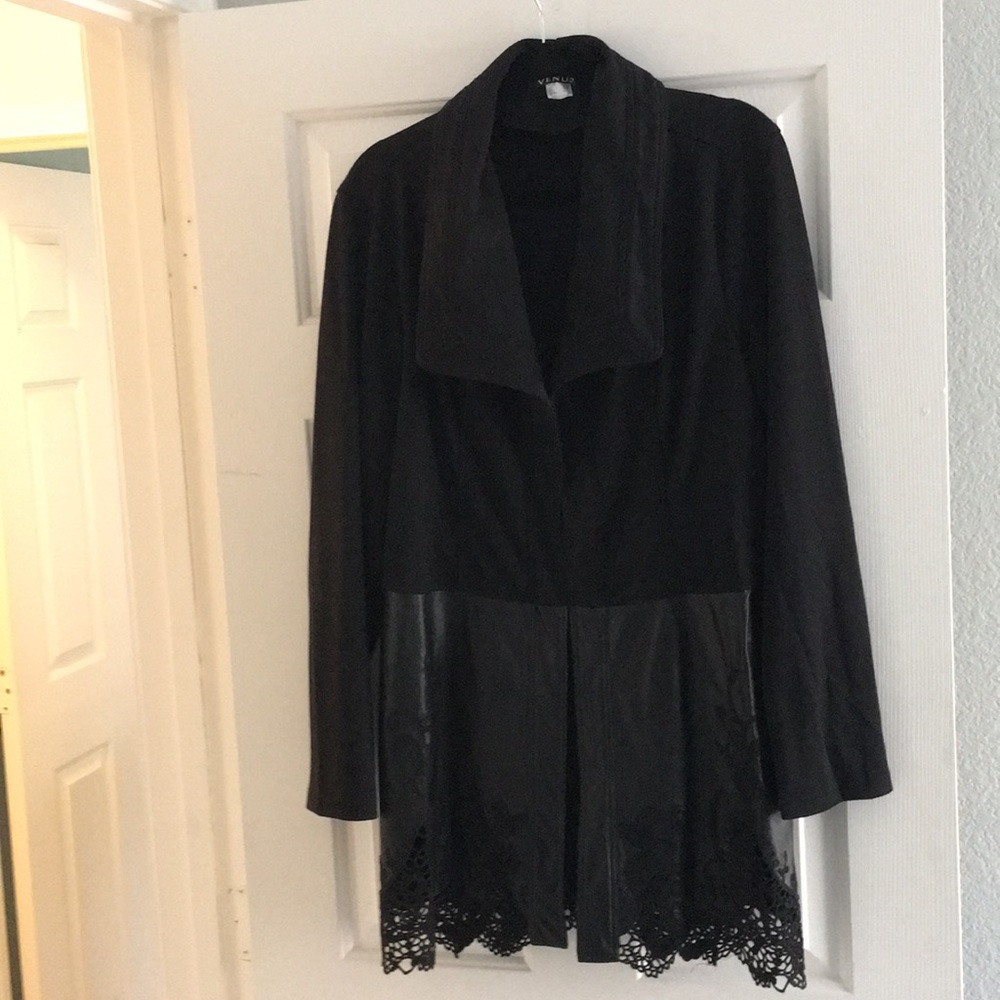 Black Jacket with faux leather bottom.